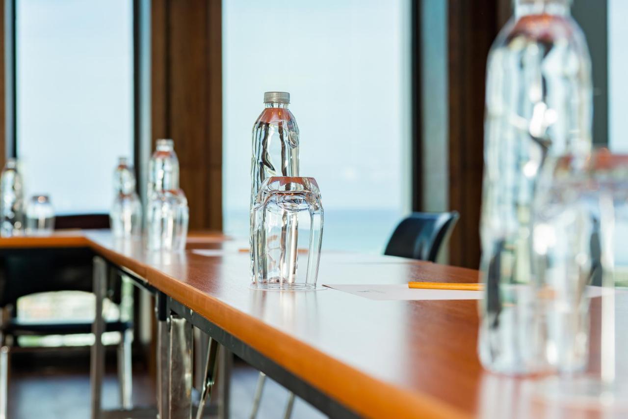 Arbour Hotel And Residence Pattaya Exterior foto Bottled water on a table