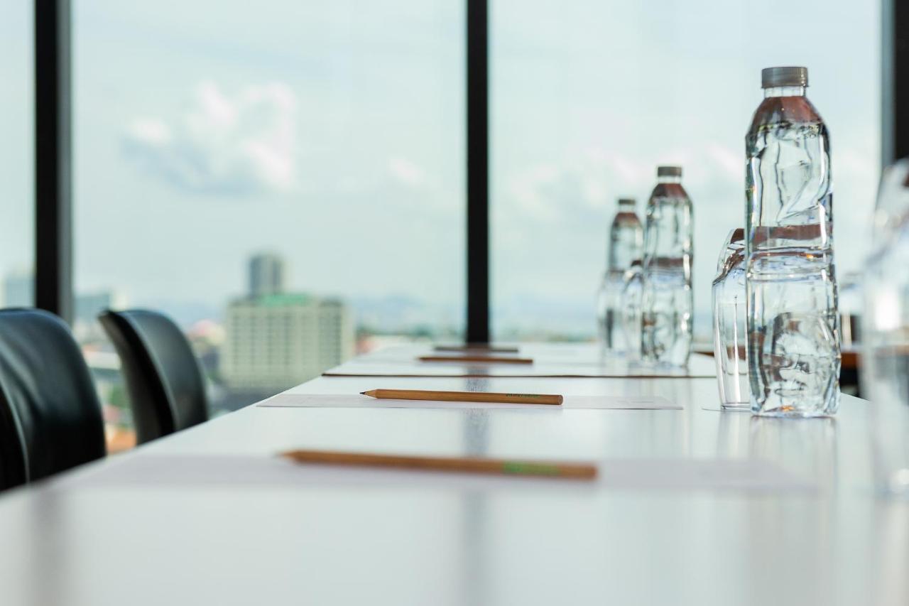 Arbour Hotel And Residence Pattaya Exterior foto Bottled water on a conference table